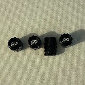 Infinity valve Stem caps in black set of 4 NWT